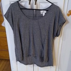 T-shirt with zipper closure on back.